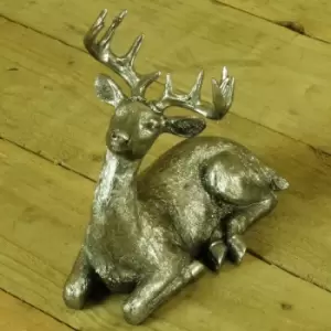 image of 23cm Polyresin Silver Christmas Sitting Deer