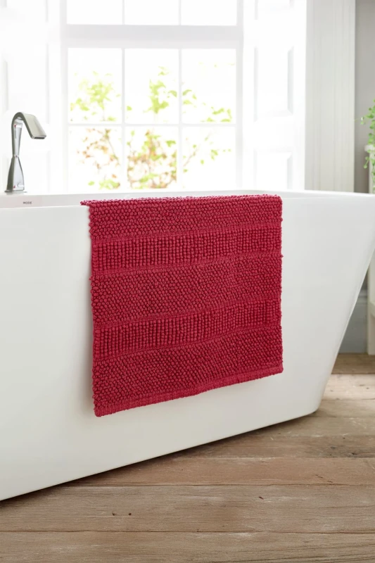 Image of Deyongs Deyongs Romeo Textured 100% Cotton Bath Mat - 1500gsm Absorbent Bathroom Rug in Raspberry Raspberry Bath Mat Unisex 5054990136879