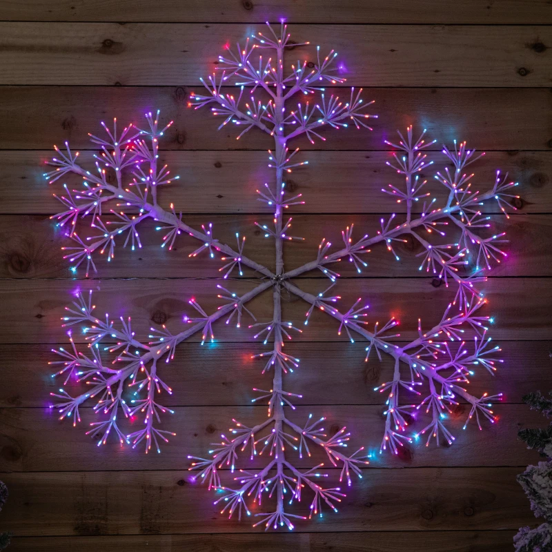 Image of 1.2m Twinkling Starburst Snowflake Christmas decoration with 960 Rainbow LEDs