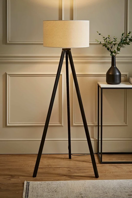Image of ValueLights Barbro Black Wood Tripod Floor Lamp with Natural Linen with Trim Drum Shade White