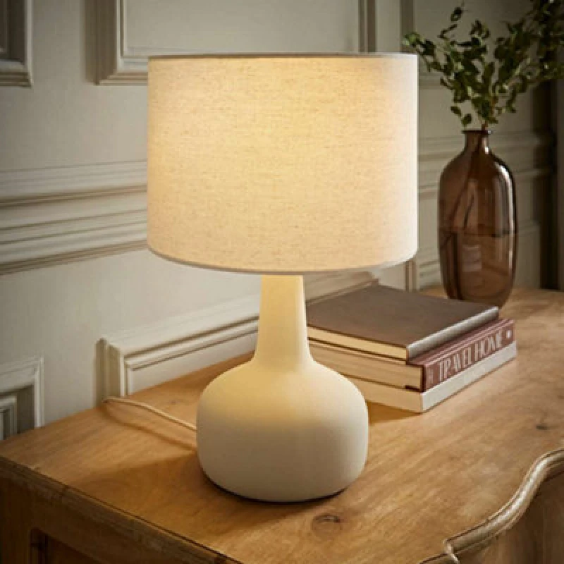 Image of ValueLights ValueLights Hayley Natural Linen Drum Shade Squat Base Ceramic Stonewear Table Lamp in Beige Beige One Size Unisex 5016529271567
