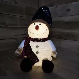 image of 65cm Warm White Festive LED Christmas Snowman Decoration With Sequin Blue Hat & Pink Scarf