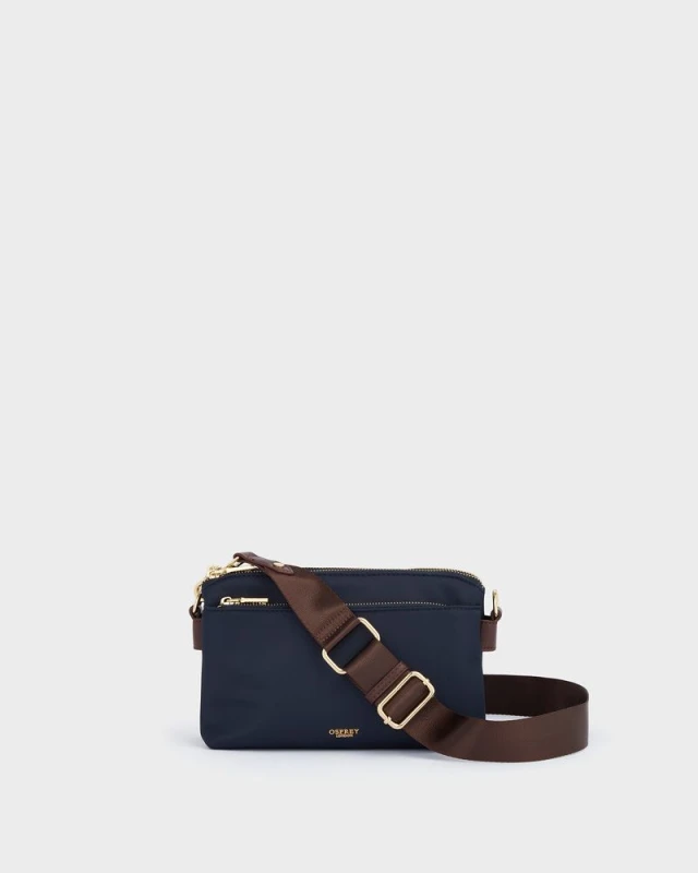 Image of OSPREY LONDON Womens The Voyage Nylon Crossbody Bag in Navy Navy Female One Size