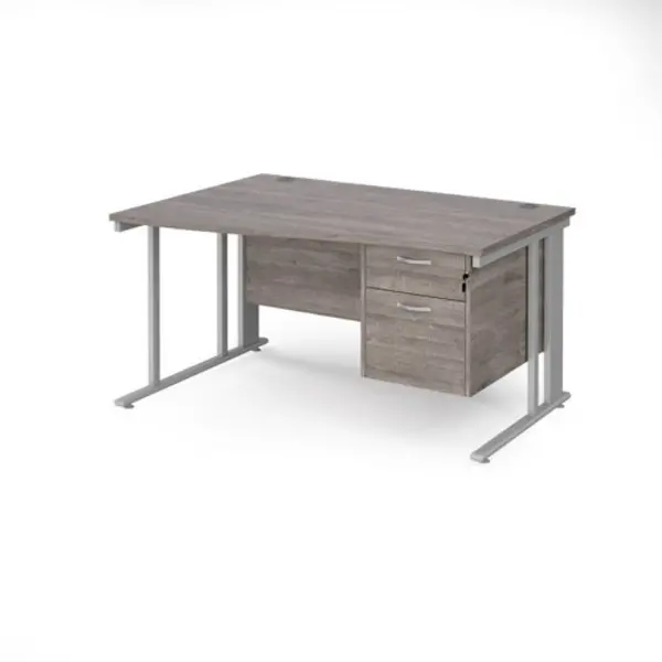 Image of Maestro 25 left hand wave desk 1400mm wide with 2 drawer pedestal - silver cable managed leg frame, grey oak top