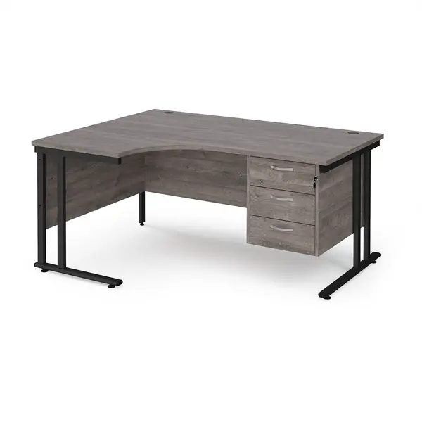 image of Maestro 25 left hand ergonomic desk 1600mm wide with 3 drawer pedestal - Black cantilever leg frame, grey oak top