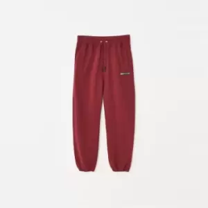 image of Mennace Badge Fleece Joggers - Red