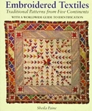 Image of embroidered textiles traditional patterns from five continents with a world