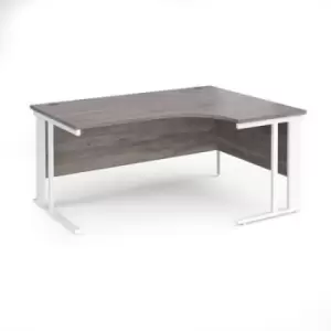 Image of Maestro 25 right hand ergonomic desk 1600mm wide - white cable managed leg frame and grey oak top