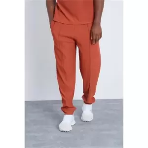 Image of I Saw It First Rust Ribbed Pintuck Joggers - Orange