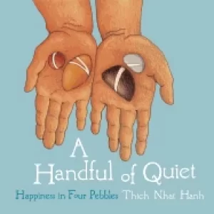 Image of handful of quiet happiness in four pebbles