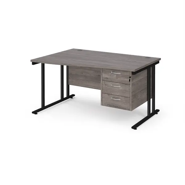 image of Maestro 25 left hand wave desk 1400mm wide with 3 drawer pedestal - Black cantilever leg frame, grey oak top