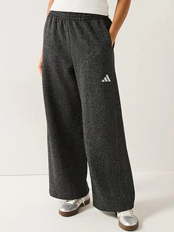 Image of adidas Womens Glitter Closed Hem Fleece Joggers Black female M (12-14)