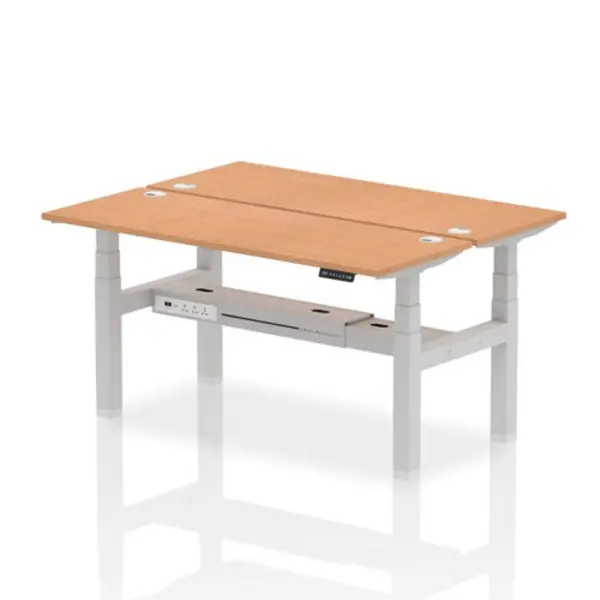 Image of Air Air Back-to-Back 1600 x 600mm Height Adjustable 2 Person Bench Desk Oak Top with Cable Ports Silver Frame HASCP2P16600OAKS
