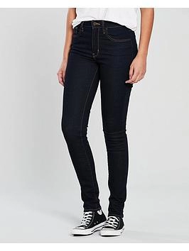 Image of Levis 721 HIGH RISE SKINNY womens in Blue. Sizes available:US 26 / 32,US 27 / 32,US 28 / 32,US 29 / 32,US 27 / 34,US 28 / 34,US 29 / 34,US 25 / 32,US