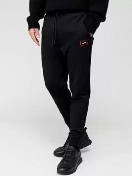 Image of HUGO Dyssop Cotton Terry Tracksuit Bottoms with Red Frame Logo - Black, Size XL, Men