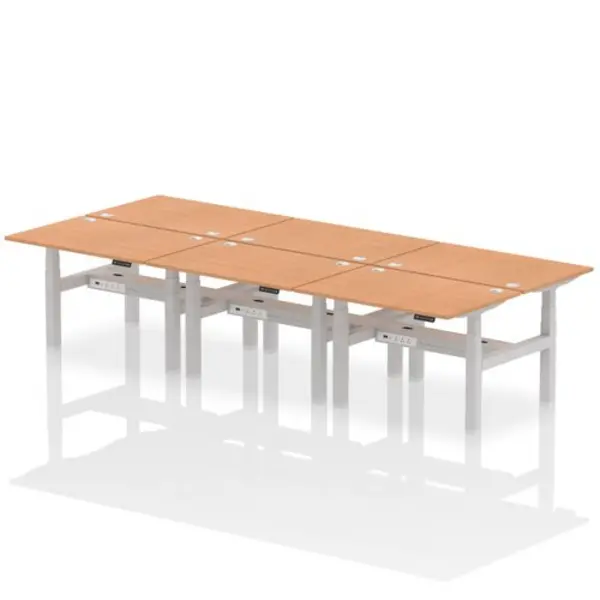 Image of Air Air Back-to-Back 1200 x 800mm Height Adjustable 6 Person Bench Desk Oak Top with Cable Ports Silver Frame HASCP6P12800OAKS