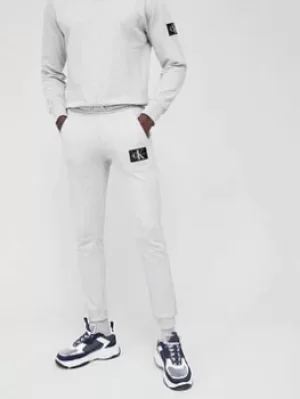 Image of Calvin Klein Jeans Calvin Klein Jeans Monogram Badge Joggers, Light Grey Heather, Size L, Men
