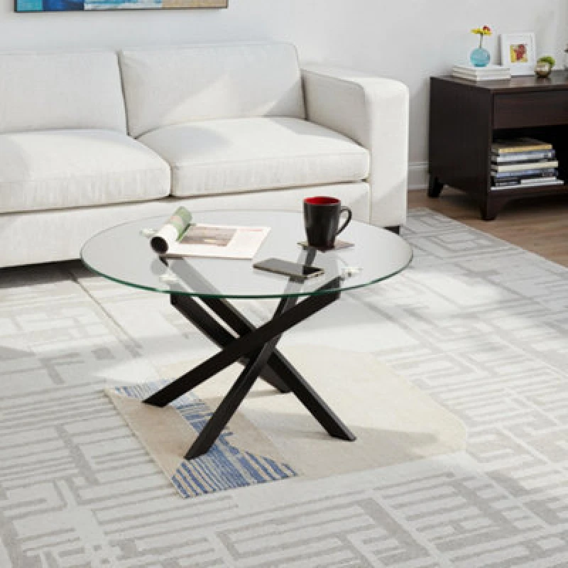 Image of Seconique Sheldon Coffee Round Table Clear Glass Top With Stylish Black Wavy Legs