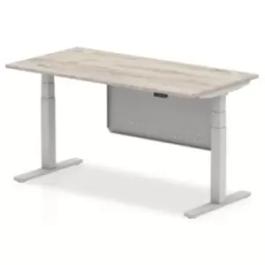 Image of Air 1600 x 800mm Height Adjustable Desk Grey Oak Top Silver Leg With Silver Steel Modesty Panel