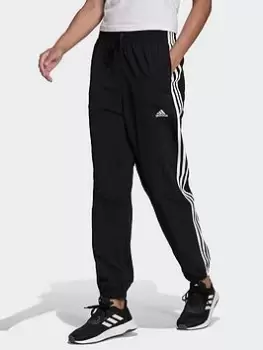 Image of adidas Essentials 3-stripes Woven 7/8 Tracksuit Bottoms, Black/White Size XL Women
