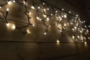 Image of 300 LED (6m) Warm White Connectable Icicle Lights on a Black Cable