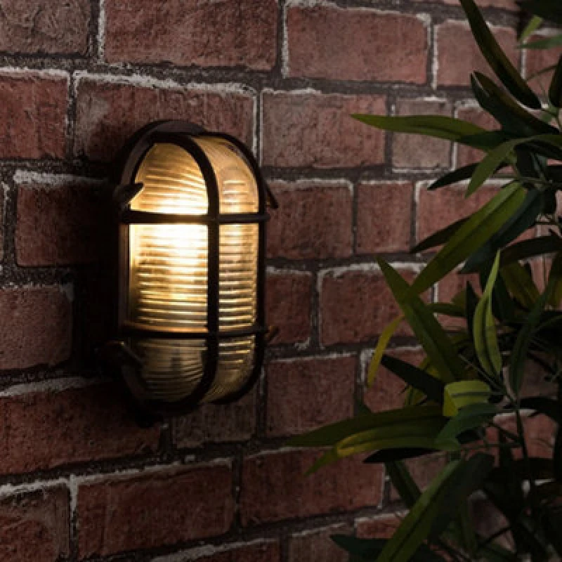Image of ValueLights ValueLights Bow Oval Bulkhead IP64 Outdoor Garden Wall Light with Cool White Bulb in Bronze Bronze One Size Unisex 5059406001857