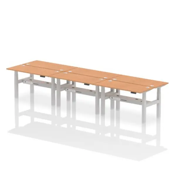 Image of Air Air Back-to-Back 1400 x 600mm Height Adjustable 6 Person Bench Desk Oak Top with Cable Ports Silver Frame HASCP6P14600OAKS