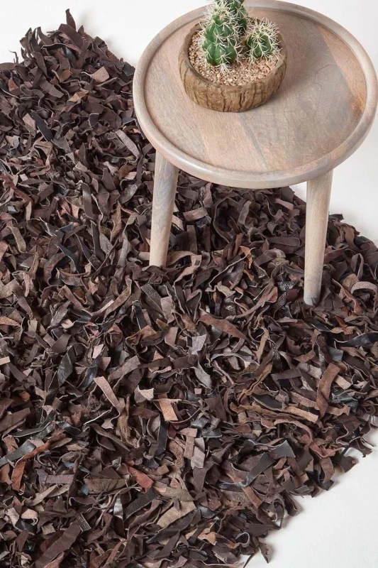 Image of Homescapes Dallas Leather Shaggy Rug Chocolate, 90 X 150 Cm