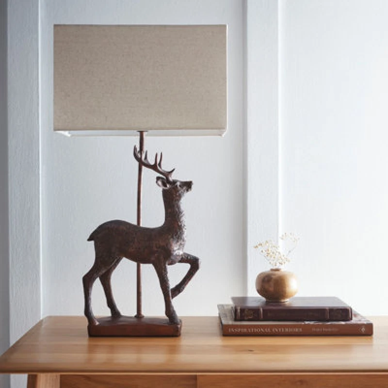 Image of K Living Stag Table Lamp In An Antique Copper Resin Table Lamp With A Natural Linen Lampshade