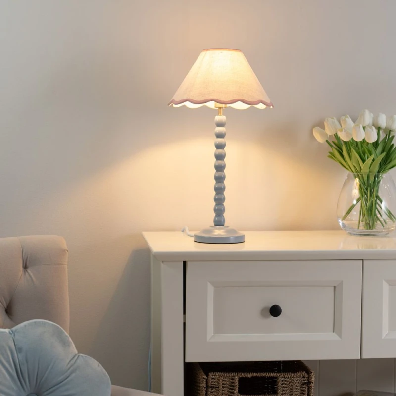 Image of ValueLights Bobbins Powder Blue Table Lamp with Tapered Natural Linen Scallop Shade Pink