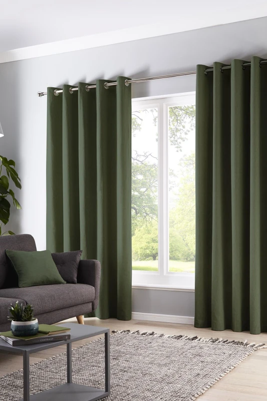 Image of Fusion 'Cannes' 100% Cotton Black Out Plain Dyed Eyelet Curtains in Bottle Green Size: 117cm width x 183cm drop Bottle Green Unisex 117cm width x