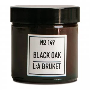 image of LA Bruket Small Black Oak Scented Candle 50g