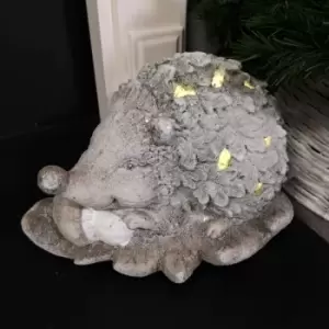 Image of 24cm Battery Lit Magnesia Christmas Hedgehog on Leaf with Warm White LEDs