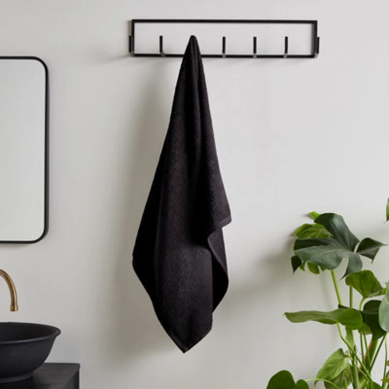 Image of Catherine Lansfield Catherine Lansfield 'Quick Dry Cotton' Towel Collection in Black Size: Hand Towel Black Hand Towel Unisex 5057681107127