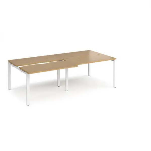 Image of Adapt Bench Desk 4 Person Rectangular Desks 2400mm With Sliding Tops Oak Tops With White Frames 1200mm Depth Adapt Oak STE2412-WH-O