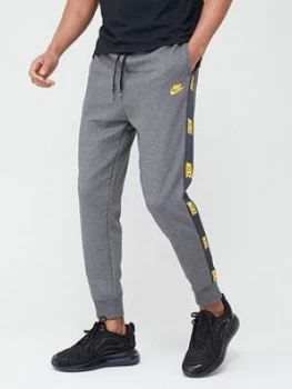 Image of Nike Hybrid Nylon Taped Pants - Grey