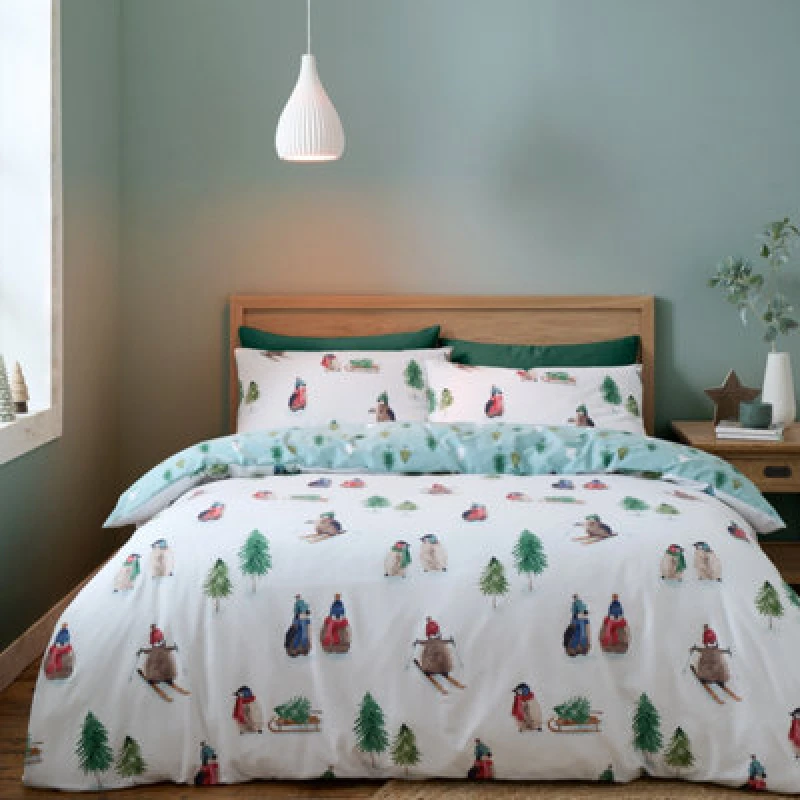 Image of Catherine Lansfield Catherine Lansfield 'Brushed Snowy Penguin' Cotton Reversible Duvet Cover Set in White Size: King White King Unisex 505768115723