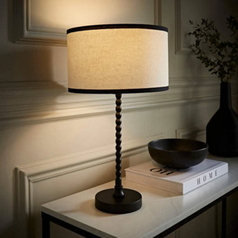 Image of ValueLights ValueLights Maeve Natural Linen Black Trim Drum Shade Matte Black Bobbin Bobble Table Lamp Black One Size Unisex 5059406065460