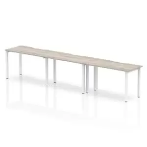 Image of Single White Frame Bench Desk 1200 Grey Oak 3 Pod