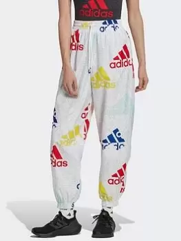 Image of adidas Essentials Multi-colored Logo Loose Fit Woven Tracksuit Bottoms, Dark Grey Size XS Women