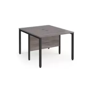 image of Maestro 25 back to back straight desks 1000mm x 1200mm - Black bench leg frame and grey oak top