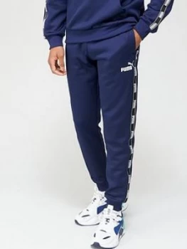 Image of Puma Tape Poly Track Pants - Peacoat