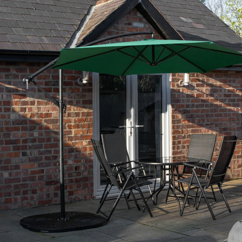 Image of Outdoor 4 Person Round Glass Top Garden Dining Table Chairs With Green Banana Parasol and Base Set