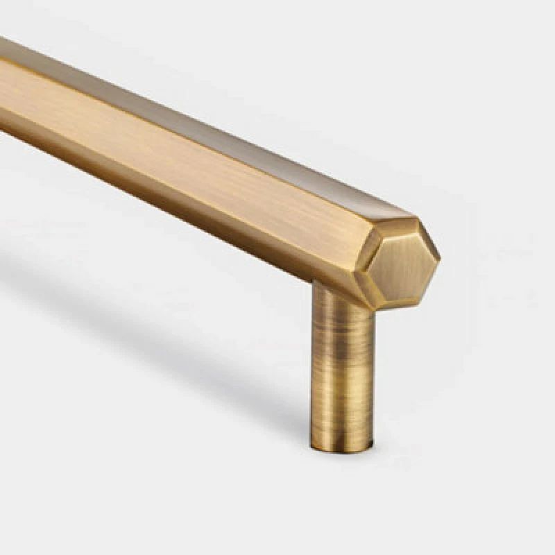 Image of Pushka Home Brass Hexagonal Bar Handle With Hole Centre 160mm - Antique Gold