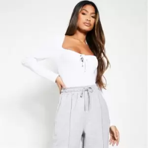 Image of I Saw It First Viscose Rib Long Sleeve Tie Front Bodysuit - White