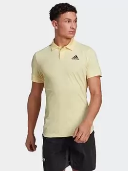 Image of adidas Tennis New York FreeLift Polo Shirt, Yellow Size M Men